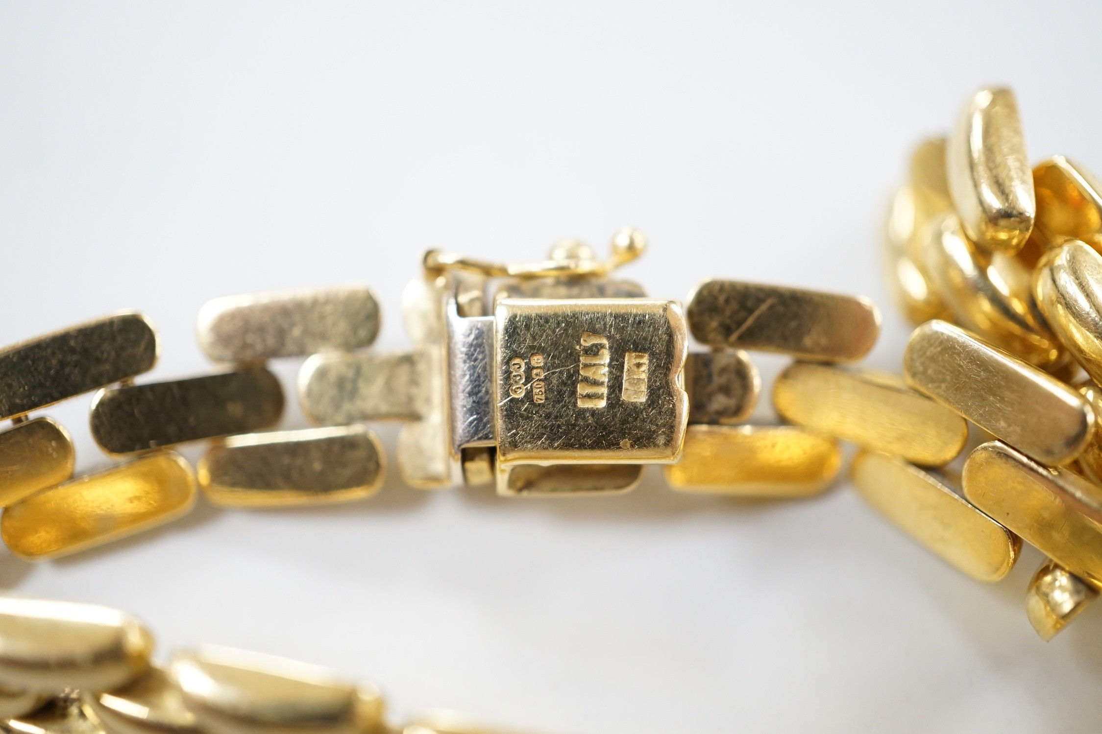 A modern 18ct gold brick link bracelet, 19cm, 21.2 grams.